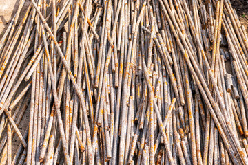 Rebar  metal rods on a sidewalk.  Background.  Banner type space.