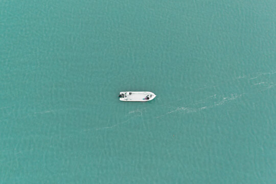 Aerial view of a Fisheman's boat with fishing gear during high tide in Pointe de la Fumee, Fouras, Moeze-Oleron Nature Reserve, Charente Maritime, France.