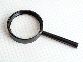 Magnifying glass on a notebook, notepad, farsightedness, old age, vision problems, reading small...