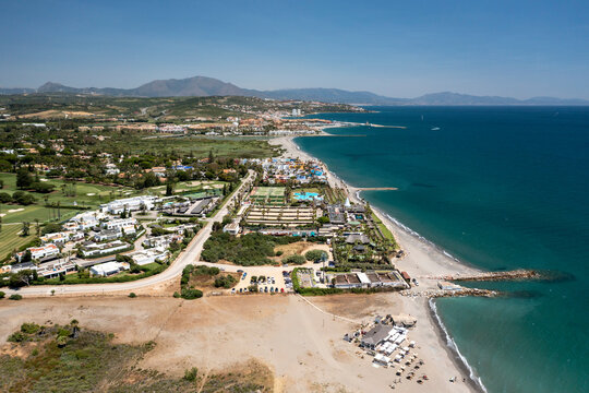 Aerial view of Sotogrande township facing the Mediterranean sea, Cadiz, Andalusia, Spain.