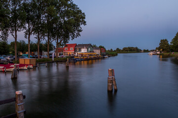 Naklejka premium boats in the river