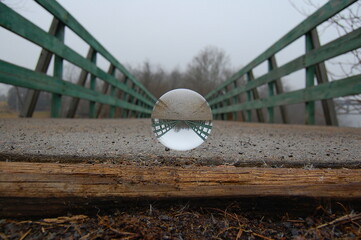 Glass ball on bridge