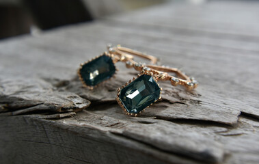 Gold earrings with blue gems