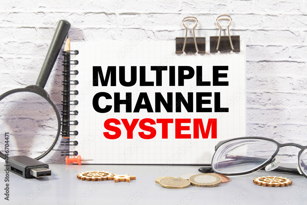 Poster text multiple channel system on white business noteboock