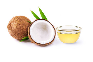 Coconut and glass of oil on white background