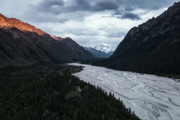 River and mountains at sunset.