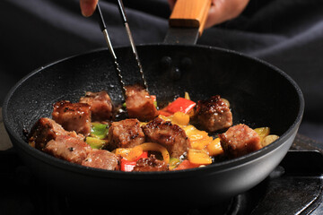Close Up Grilled Cube Dice Beef Steak with Paprika and Barbeque Sauce. Delicious Beef Black Pepper...