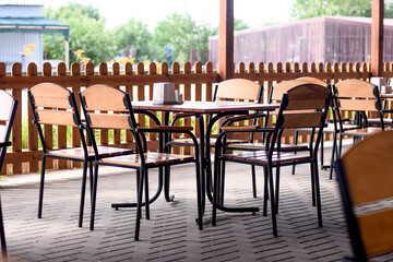 an empty cafe on the street without customers. there are no clients in the restaurant. Selective focus