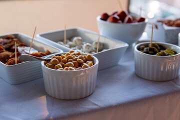 bowl of fingerfood, snakcks, cremutch