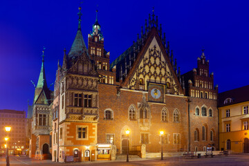 Night view of illuminated Wroclaw Old Town Hall on Market Square in spring, Poland.
