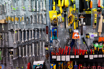 Various repair tools for sale on hardware store showcase .