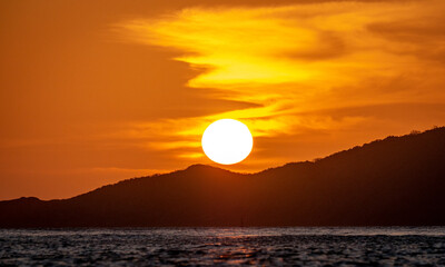 Sunsest over the mountains and ocean