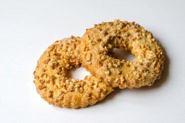 Two Peanut Cookie Rings on a light background. Crunchy delicious