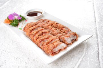 deep fried bbq crispy fragrant fat pork belly meat with chef sweet dark soy sauce in white background asian banquet menu