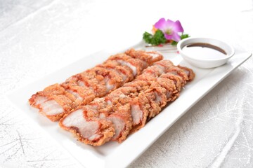 deep fried bbq crispy fragrant fat pork belly meat with chef sweet dark soy sauce in white background asian banquet menu