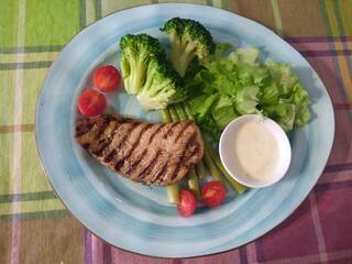 Turkey steak with vegetables and sauce
