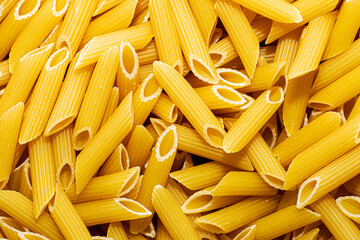italian penne pasta fluted close - up background backdrop