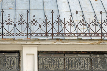 Metal decorations on the facade of a historic building