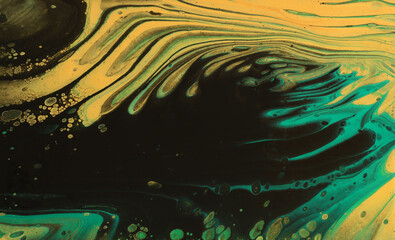art photography of abstract marbleized effect background. Black, green and gold creative colors. Beautiful paint