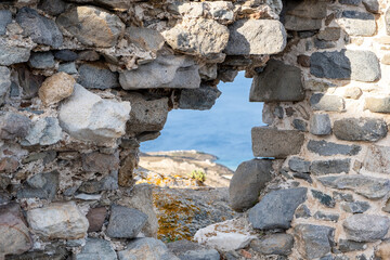 Serifos island, Cyclades Greece. Aegean blue sea between rocks.