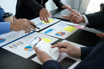 Meeting business team leaders about charts, financial graphs showing results are analyzing and calculating planning strategies, business success building processes