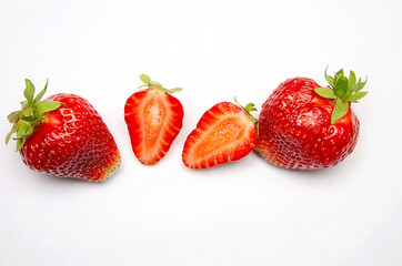 Strawberries on a white background, close-up, Whole and half of strawberries. on white. ..