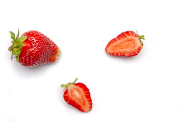Strawberries on a white background, close-up, Whole and half of strawberries. on white. ..