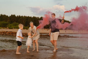 Gender reveal announcement on the beach. Loving family expecting baby girl. Happy moments