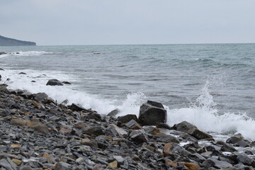 Stormy Black Sea. Pebble beach of Anapa.