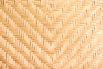 Abstract background of brown woven bamboo, Asian handicrafts, natural materials, products. Sustainability concept.