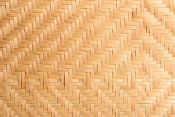 Abstract background of brown woven bamboo, Asian handicrafts, natural materials, products. Sustainability concept.