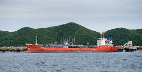 Chemical tanker ship is berthing at shore for cargo operation.