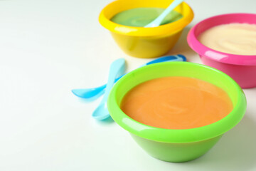 Concept of baby food on white background