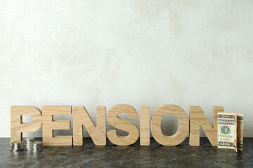 Concept of pension or retirement plan on black smokey table