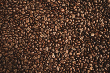 Premium Roasted coffee beans on background