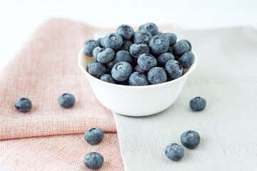 Bowl with blueberries. Close up. Selective focus