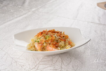 chinese style egg fried rice with japanese sakura shrimp and prawn seafood meat in white background asian halal menu