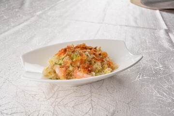 chinese style egg fried rice with japanese sakura shrimp and prawn seafood meat in white background asian halal menu