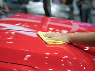 Hand wipe the car shiny clean the new car concept,Hand clean new car