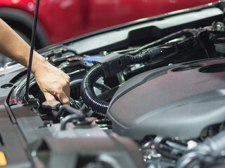 Hand checking equipment interior engine of car