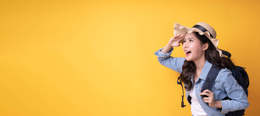 Nice looking Asian female traveler with suitcase and hats to travel during the holidays. backpacker and go to travel in weekend concept. Thing an amazing surprise, wow