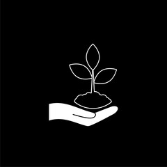 Hand carrying plant seed best for planting icon isolated on dark background