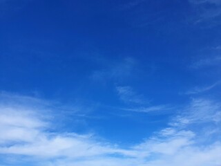 Cloudscape with blue sky and white clouds