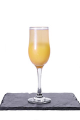 Mimosa cocktail isolated on white background