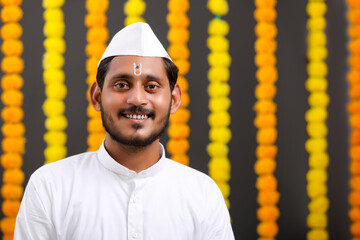 Young indian man (pilgrim) in traditional wear.
