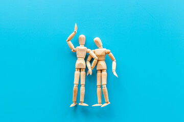 Mental and emotional gender difference between man and woman. Two wooden mannequin figurine connection