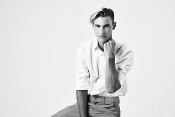 man in white shirt fashion hairstyle posing smile model