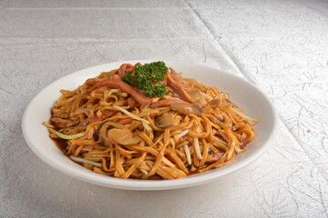 braised ee-fu thick udon noodle with seafood prawn and mushroom in dark soy sauce in white background asian halal menu