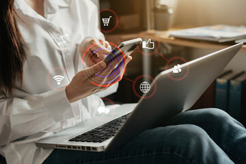 Businessman hand using smartphone and laptop at home. Digital marketing media mobile app in virtual...