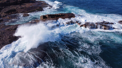 Violent Sea Breaking On The Sturdy Rocks
